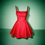 A-line mini dress with a slim waist and a bow tie
