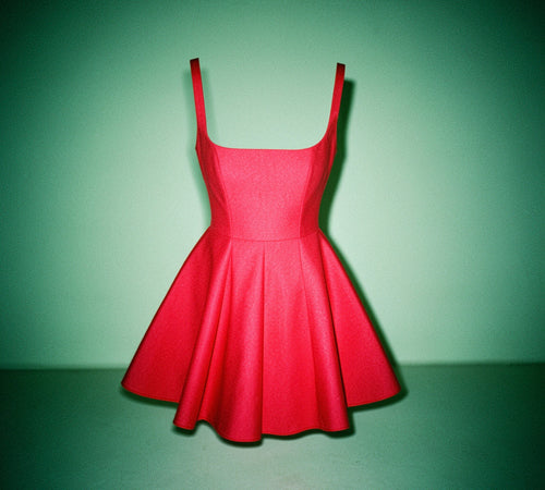 A-line mini dress with a slim waist and a bow tie